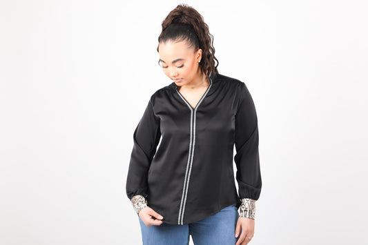 Blouse élégante moderne avec une touche d'artisanat marocain
